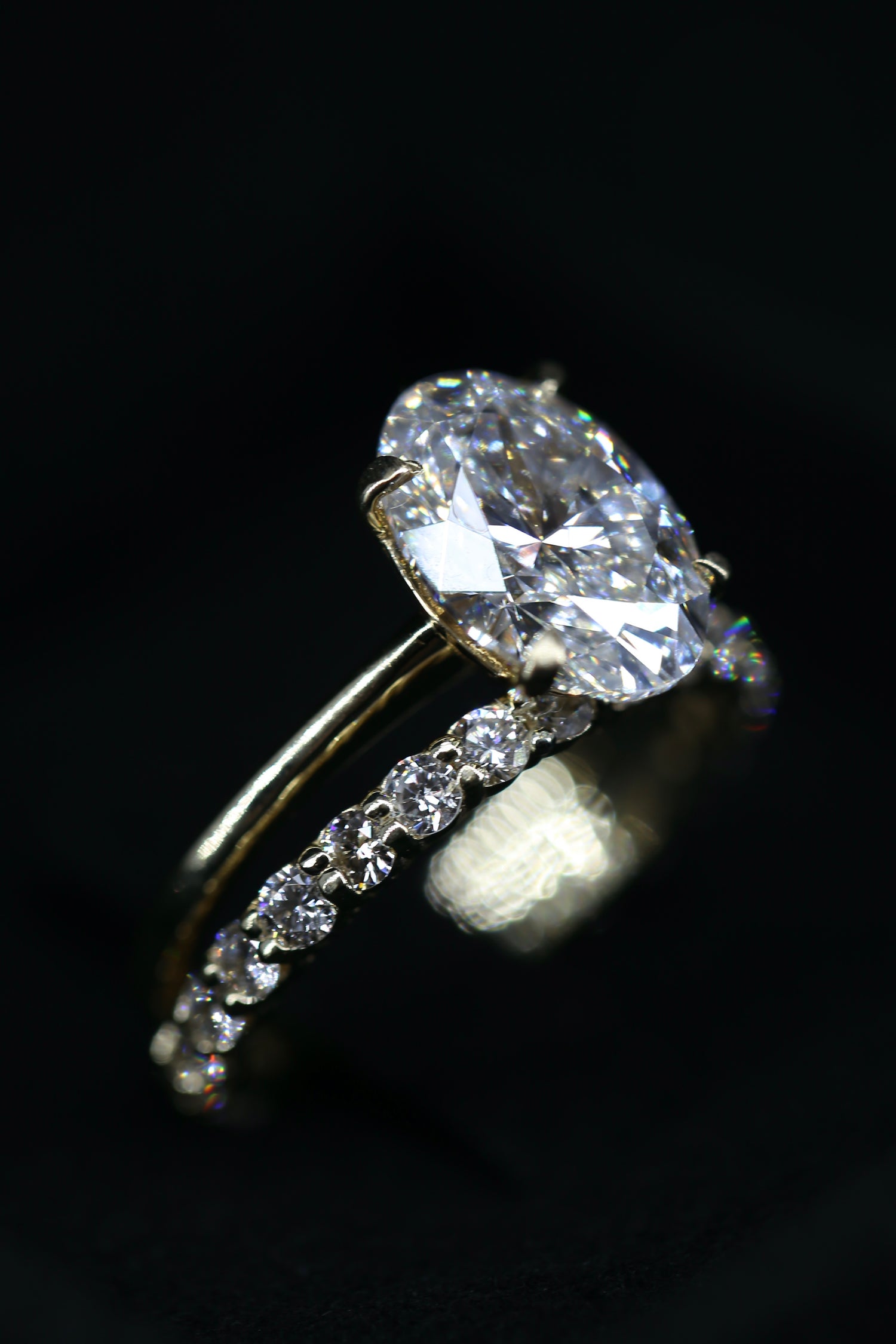 3 carat oval lab grown diamond ring GIA certified yellow gold with wedding band