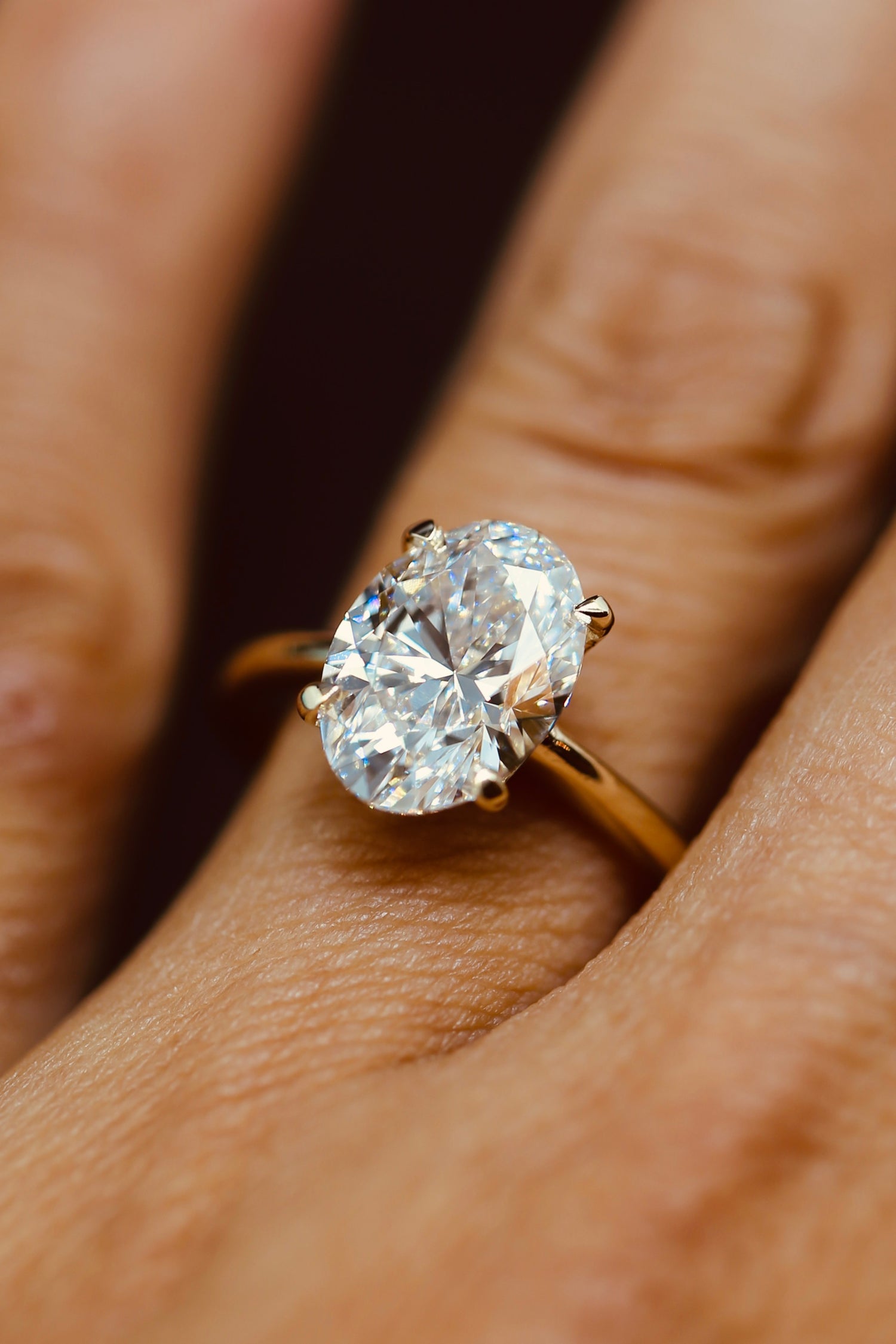 3 carat oval lab grown diamond ring GIA certified yellow gold with wedding band